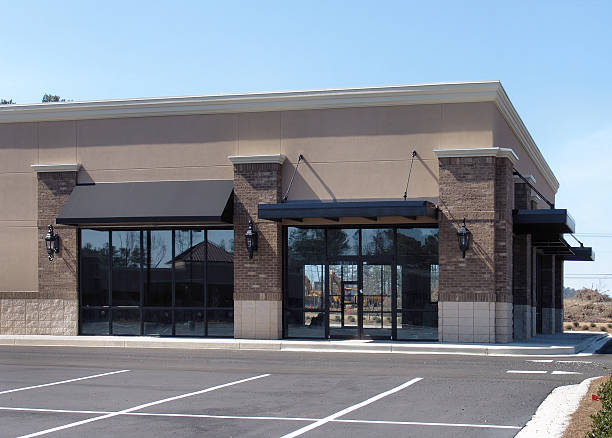 This is a standalone structure as part of a suburban shopping center nearing completion.  Stucco and brick construction.